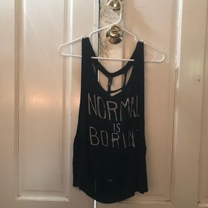Black tank top. Normal is boring.
